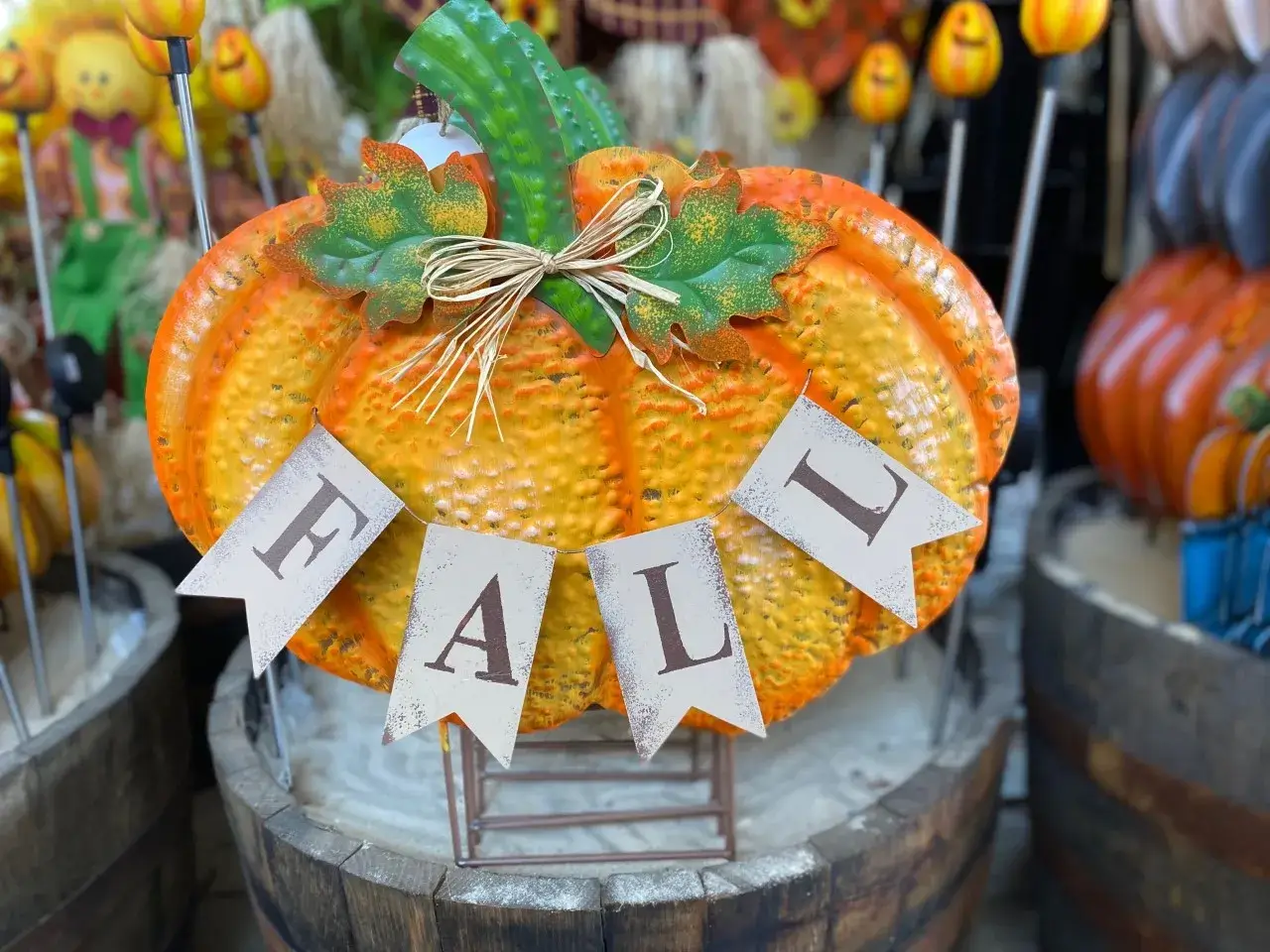 Decorative pumpkin with 'Fall' banner