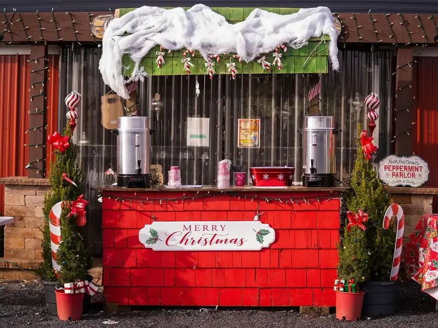 Countryview Farms Nursery Christmas Stand Festive Christmas drink stand with holiday decorations.