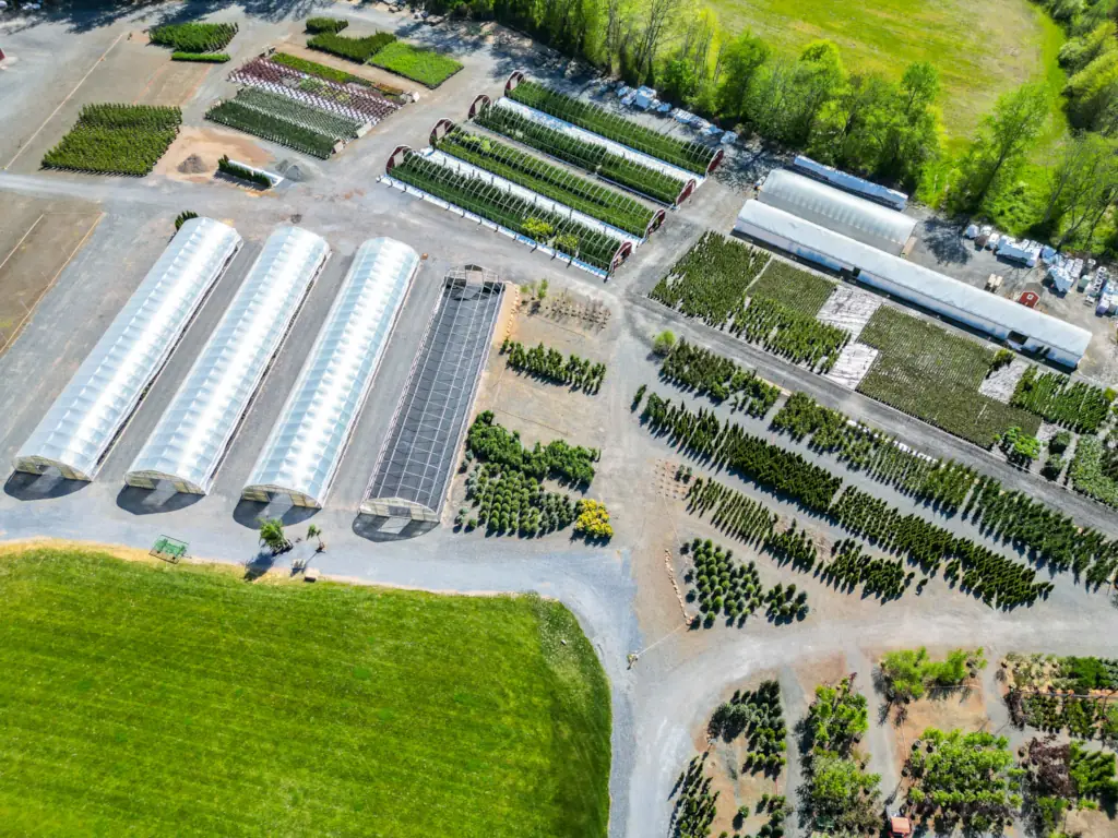 Aerial view of greenhouses and fields