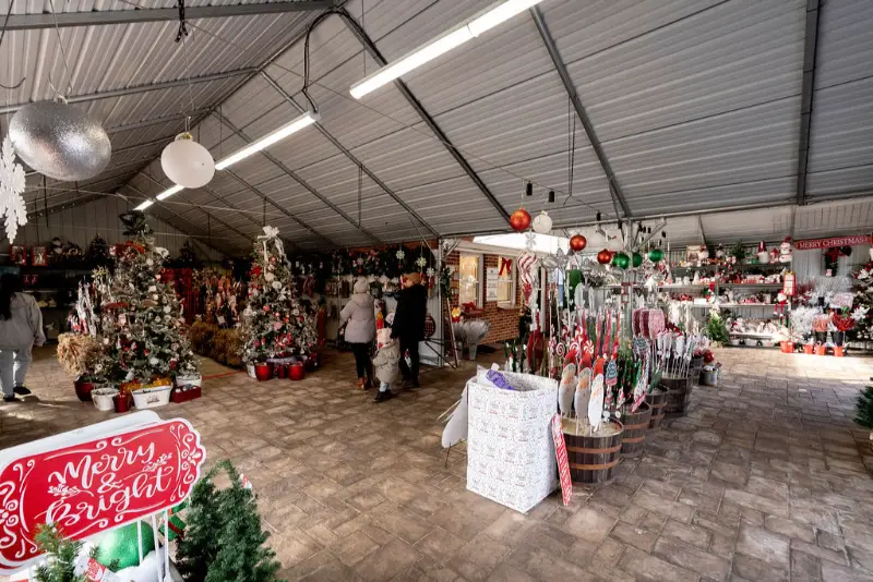Christmas decor shop with festive decorations inside.