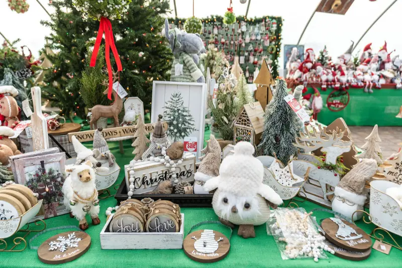 Christmas market stall with festive decorations.