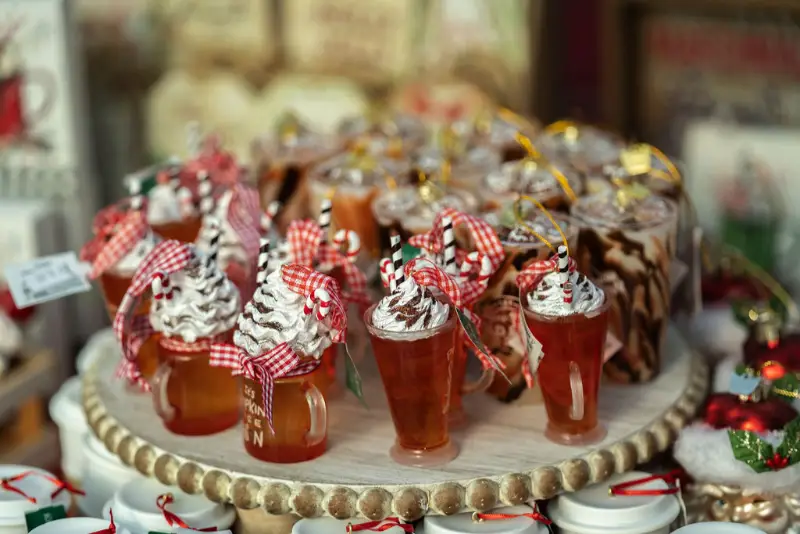 Festive drinks with whipped cream and candy canes