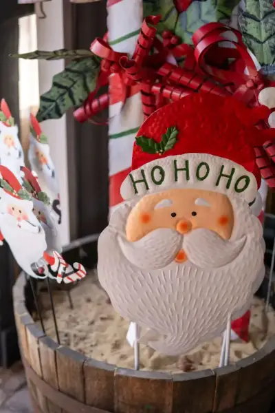 Santa decoration with Ho Ho Ho sign.