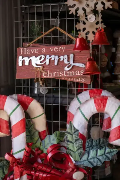 Christmas decorations with merry sign and candy canes.