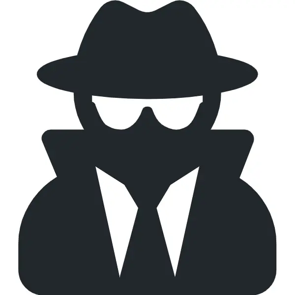 Silhouette of spy in trench coat and hat